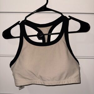 SOLD - Vuori Cream high neck sports bra with Black Trim Racerback.